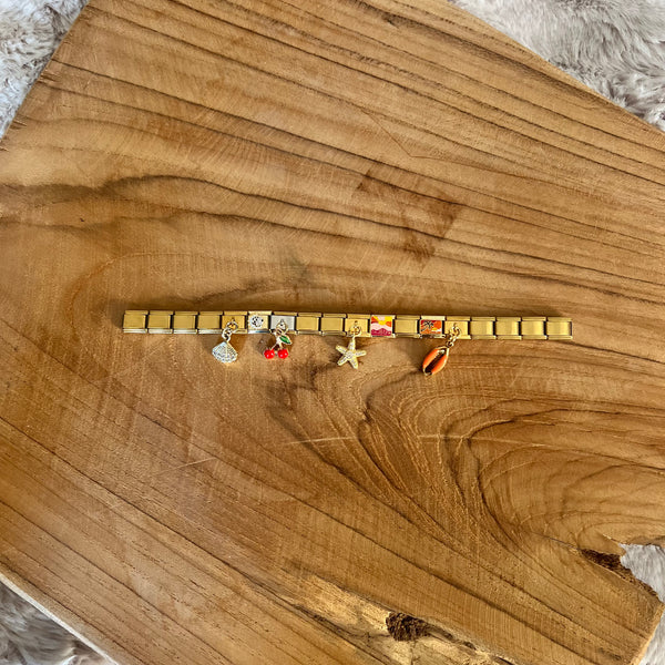 Charm de concha naranja